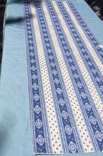 Load image into Gallery viewer, 100% plain cotton quilted reversible ciel bleu (blue) and ecru white paisley diamond table runner in two lengths. Front side has small fleur de lys reminiscent diamond motifs with a dark blue border made up of large paisley diamonds, while reverse is made up of striped bands of these two motif variants. A fractal feast of the eyes!
