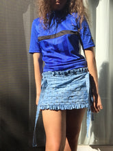 Load image into Gallery viewer, Measures 11 inches in front and 12.75 inches in back. Elastic waistband that can accommodate sizes medium (32" waist) through a large medium (38"). Sits at the top of hips/lower waist. Hand ruched front panel with scalloped barn door straps. Ruffle trims.Tiered pleated flounce at the back.