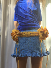 Load image into Gallery viewer, One of a kind multi-loop gift bows and drape skirt. 360 hand ruching and ruffle trims. Fits size medium to medium large. Gift bows and sash drape are centerd to back and detachable via snap closures for easy laundering, Elastic ruffle waistband that can stretch 32" to 40". 13.5" in length.