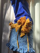 Load image into Gallery viewer, One of a kind multi-loop gift bows and drape skirt. 360 hand ruching and ruffle trims. Fits size medium to medium large. Gift bows and sash drape are centerd to back and detachable via snap closures for easy laundering, Elastic ruffle waistband that can stretch 32" to 40". 13.5" in length.