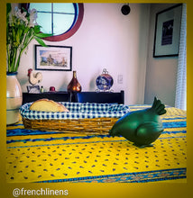 Load image into Gallery viewer, Traditional cotton print tablecloths from Avignon, France, in all cotton with a wipe clean acrylic coating. Rectangular cut is 117&quot; length and is 61&quot; inches across. PIctured here in vibrant yellow
