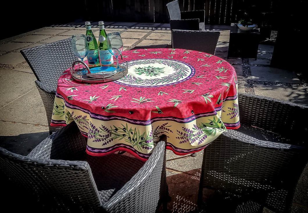 71 inches diameter, this easy care polyester tablecloth repels stains when liquids spill. Imprinted with an original Matisse inspired design. Made in France. Main colors are red/hot pink and light yellow