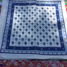 Load image into Gallery viewer, allocver abstract geometric blue ornate motifed lozenge rhombi coordinated in organized grid pattern with floral blue background thin strip layered with light blue and white stripe on border. Provence blue motif overlay on white 100% cotton.Set of 6 napkins
