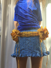 Load image into Gallery viewer, One of a kind multi-loop gift bows and drape skirt. 360 hand ruching and ruffle trims. Fits size medium to medium large. Gift bows and sash drape are centerd to back and detachable via snap closures for easy laundering, Elastic ruffle waistband that can stretch 32&quot; to 40&quot;. 13.5&quot; in length.
