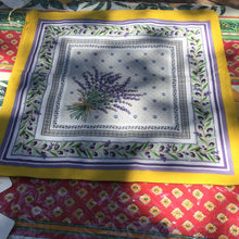 Load image into Gallery viewer, Centered lavender bouquet on a lavender calissons dotted square background bordered by several motif lines includingolive branch trellis. Comes in 100% cotton. Inner motif overlays on white and very light gray lavender, with lavender and mustard outer borders.Set of 6 napkins
