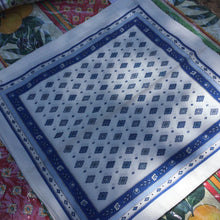 Load image into Gallery viewer, allocver abstract geometric blue ornate motifed lozenge rhombi coordinated in organized grid pattern with floral blue background thin strip layered with light blue and white stripe on border. Provence blue motif overlay on white 100% cotton.Set of 6 napkins
